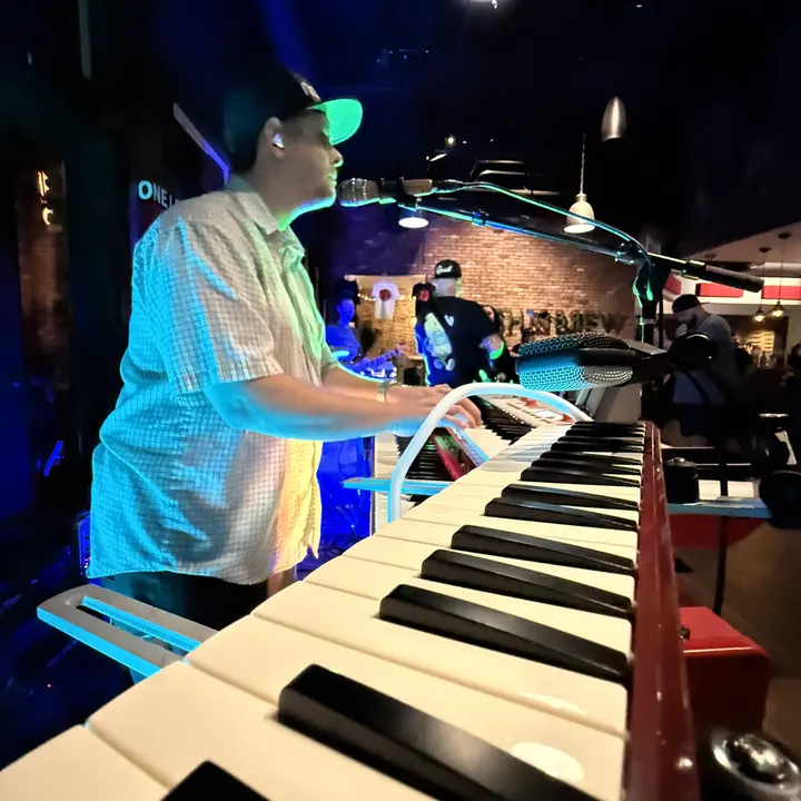 Mason Hensley playing keys on stage